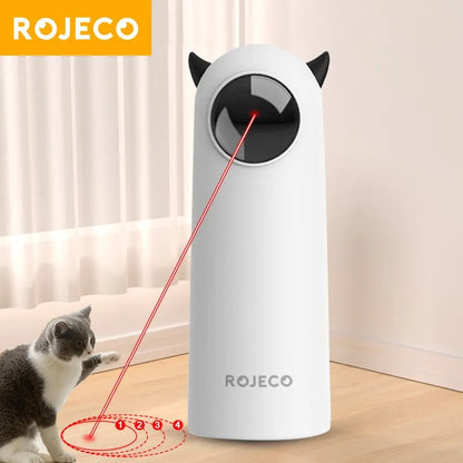 Cat chasing automatic cat laser toy beam on the floor