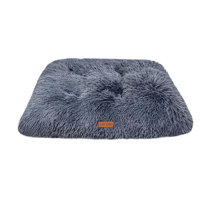 Plush washable dog bed shown in gray, soft sleeping mat for pets
